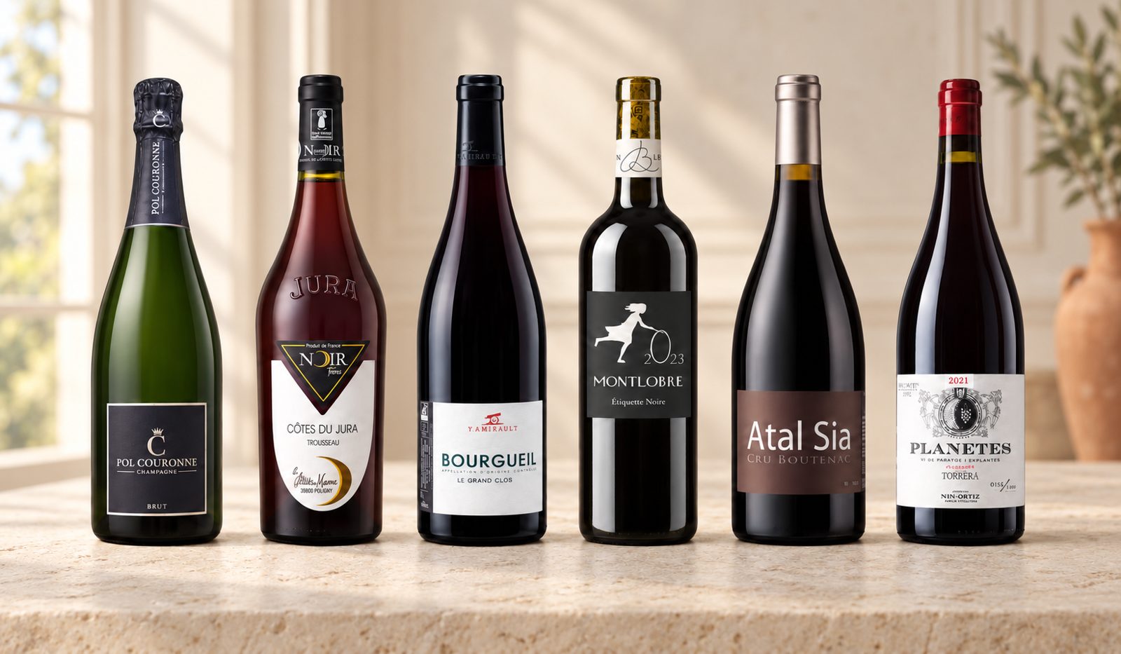 The six bottles in the collection: Pol Couronne 1887 Brut, Noir Fr&egrave;res Trousseau, Amirault Le Grand Clos, Montlobre &Eacute;tiquette Noire, Atal Sia and Planetes de Nin